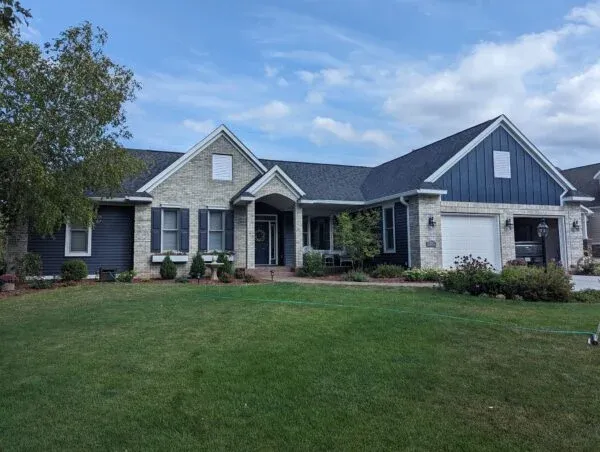 Beautiful Wisconsin home with asphalt roof and new siding